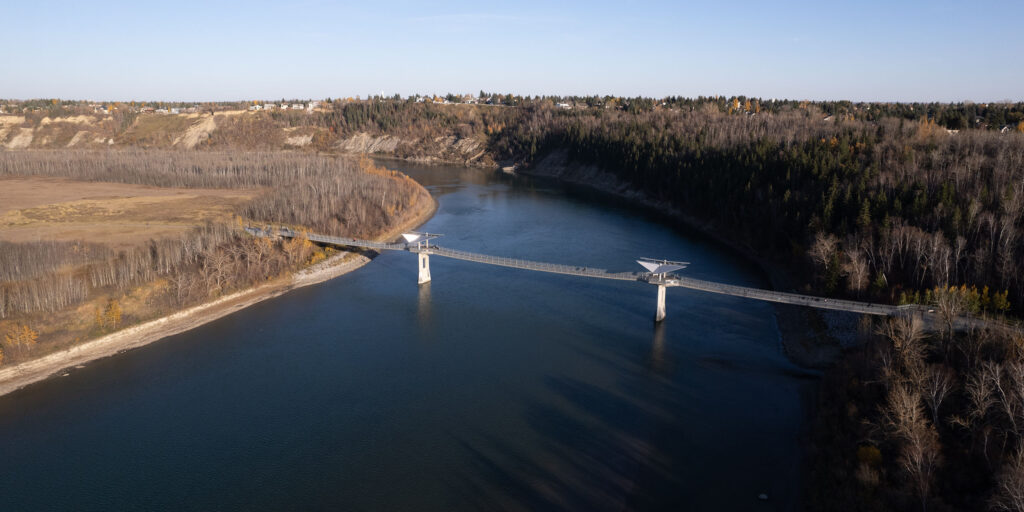 An aerial view of the Terwillegar footbridge over the North Saskatchewan River.