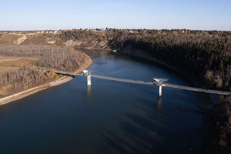 An aerial view of the Terwillegar footbridge over the North Saskatchewan River.