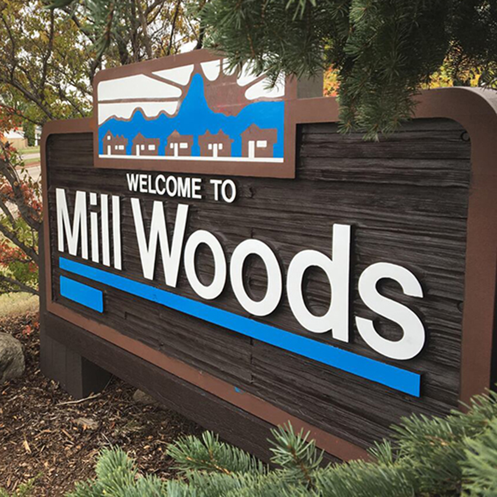 The Mill Woods community sign reads: Welcome to Mill Woods.