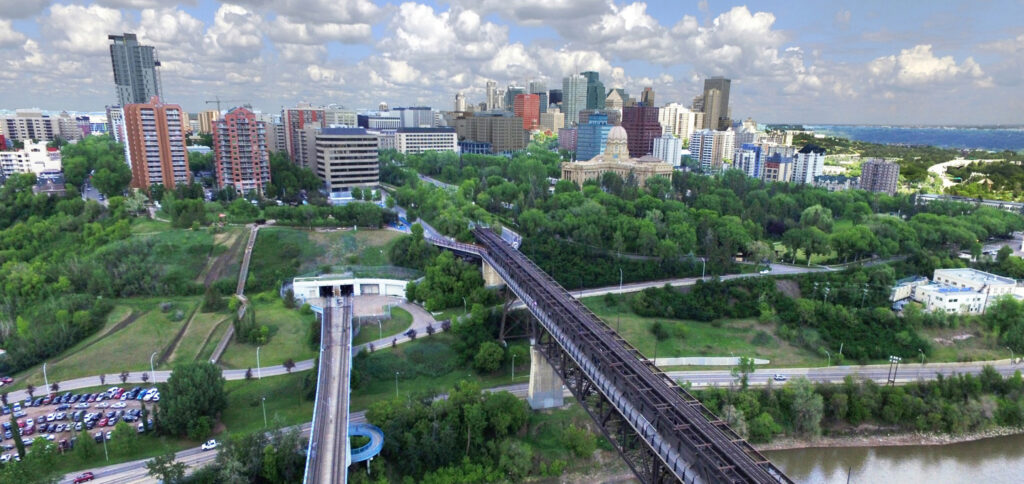 Overhead shot of Edmonton's river valley and downtown skyline.