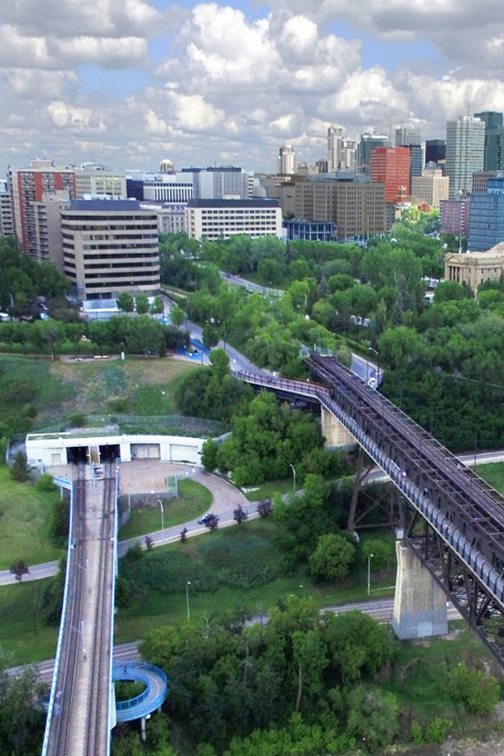 Overhead shot of Edmonton's river valley and downtown skyline.