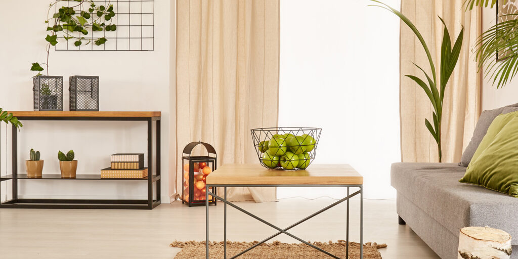 Spacious living room with green and brown accessories