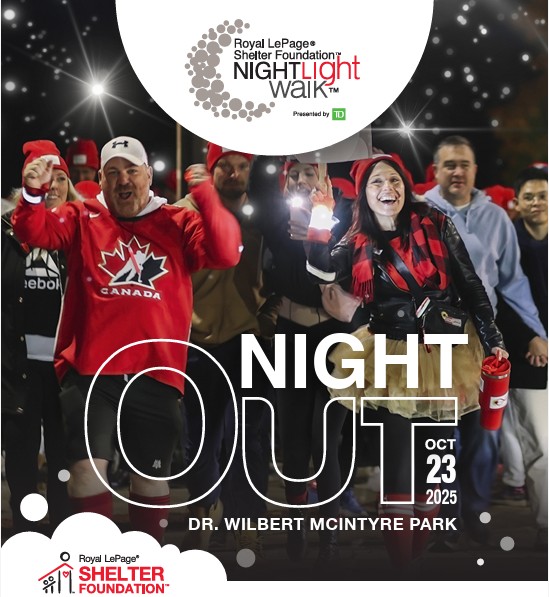 Excited group of walkers at the 2025 Night Light Walk in Edmonton, holding lanterns and smiling under night skies. Event date: October 23, 2025.