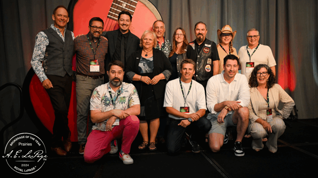 Royal LePage Noralta Real Estate accepting 2024 Prairie Brokerage of the Year at the Royal LePage National Sales Conference.