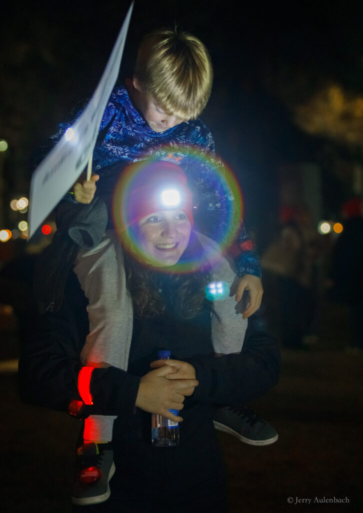 Two Cousins wearing headlamps smiling before the walk.