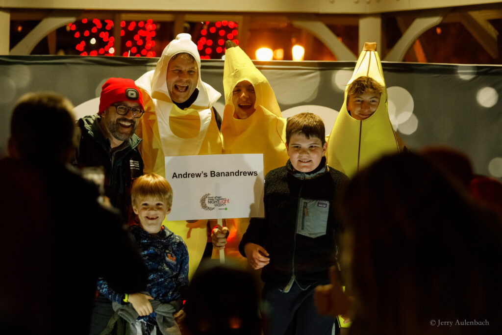 Andrew’s Banandrews team in banana costumes posing together.